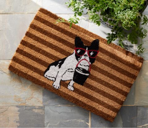 coir door mat with dog and beach pail