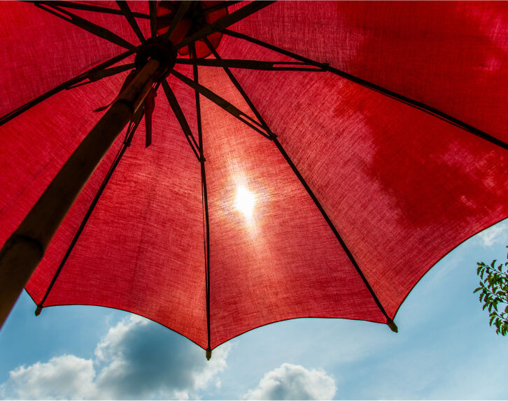 red outdoor patio umbrella